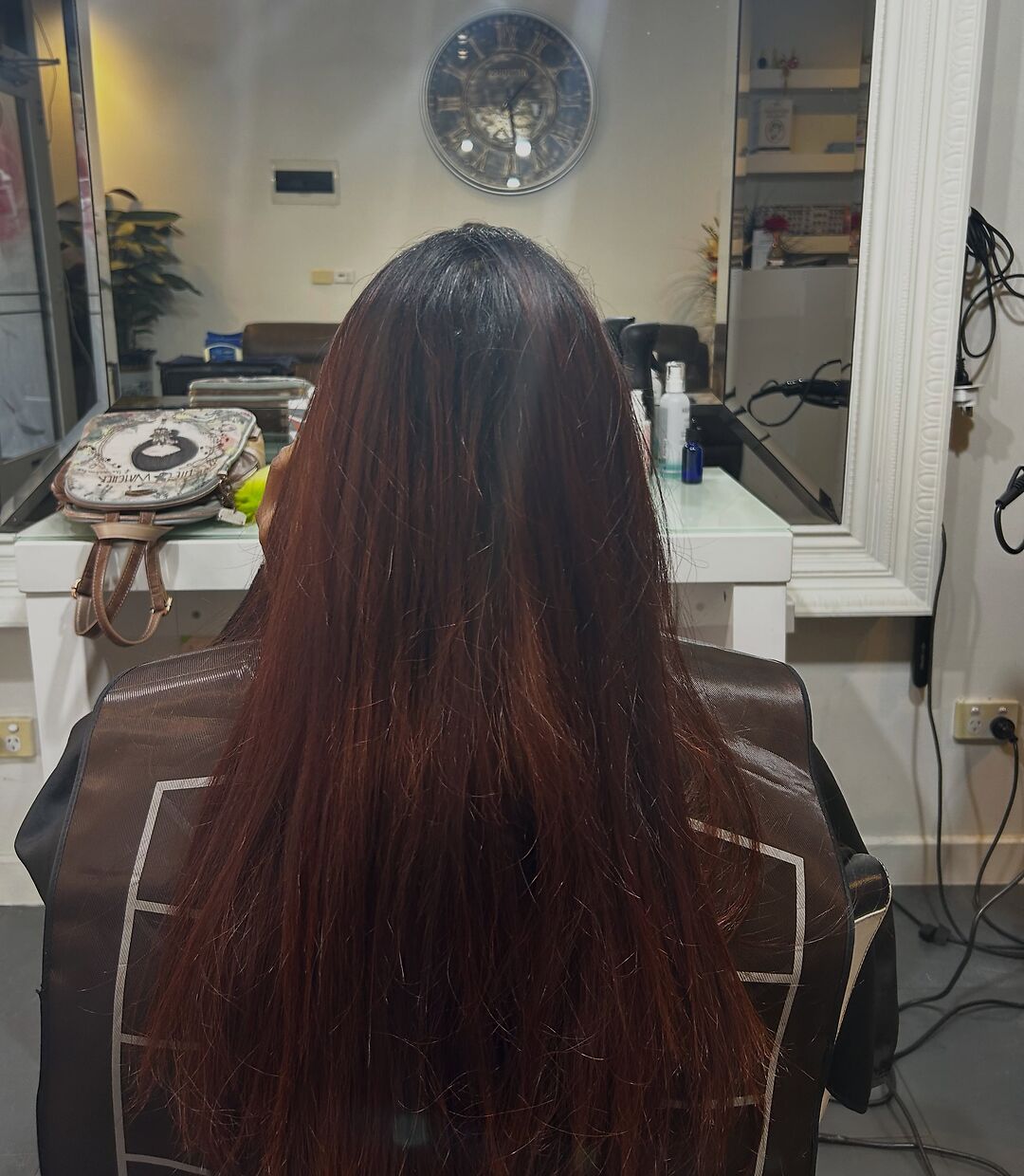 Faded auburn frizzy hair before colour correction at Akila Oakleigh