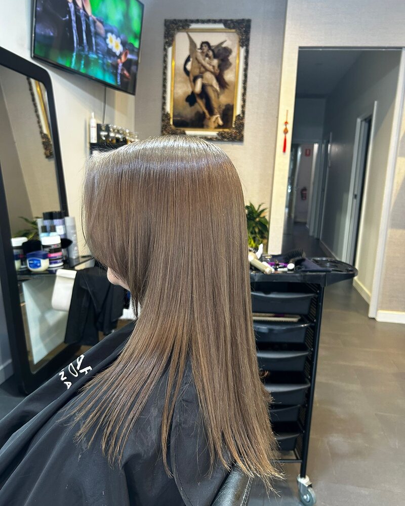 After colour correction: even cool-toned brunette, warmth removed and ends cleaned up at Akila in Oakleigh