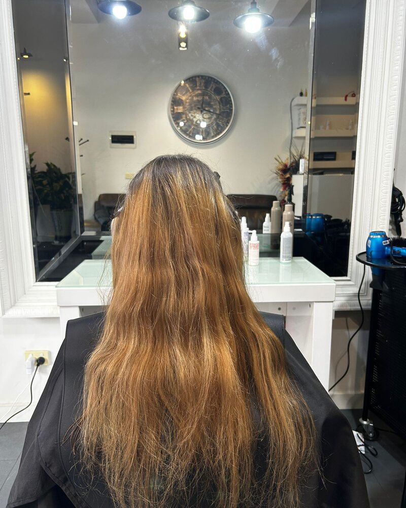 Before colour correction: brassy orange lengths with heavy warmth and dry ends at Akila in Oakleigh