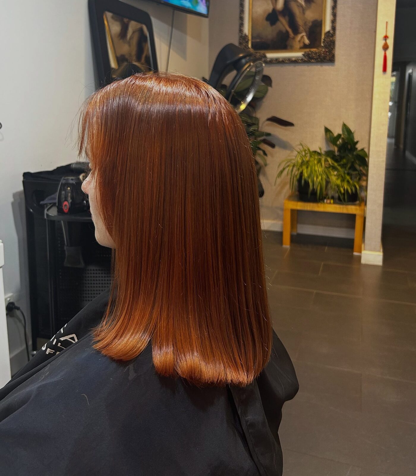 Glossy copper corrective colour result on a blunt lob at Akila in Oakleigh