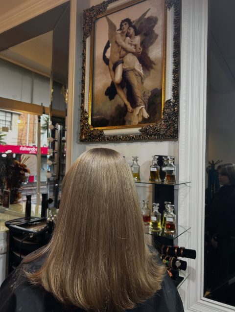 Honey blonde straight back of head at Akila