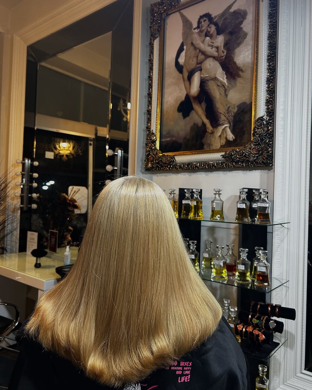 Sleek blonde colour finish at Akila Oakleigh, with Persian-touched salon setting