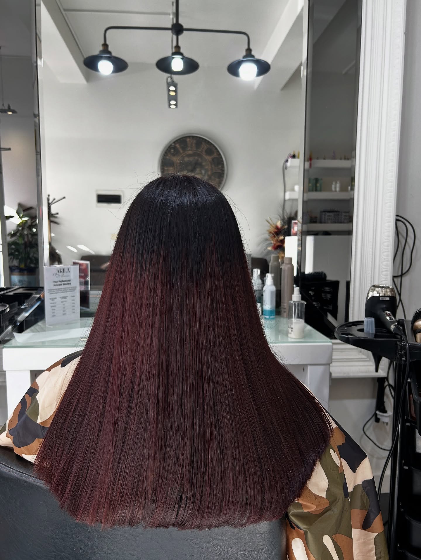 Long burgundy aubergine sleek finish at Akila Hair and Beauty, Oakleigh