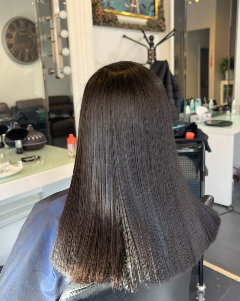 Long dark hair, straight and glossy after Cacau Brasil Nanoplastia at Akila Hair and Beauty, Oakleigh